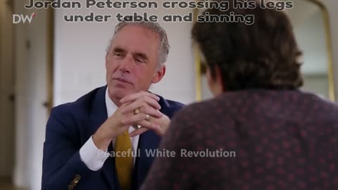 Jordan Peterson crossing his legs under a table and using Lord's name in vain