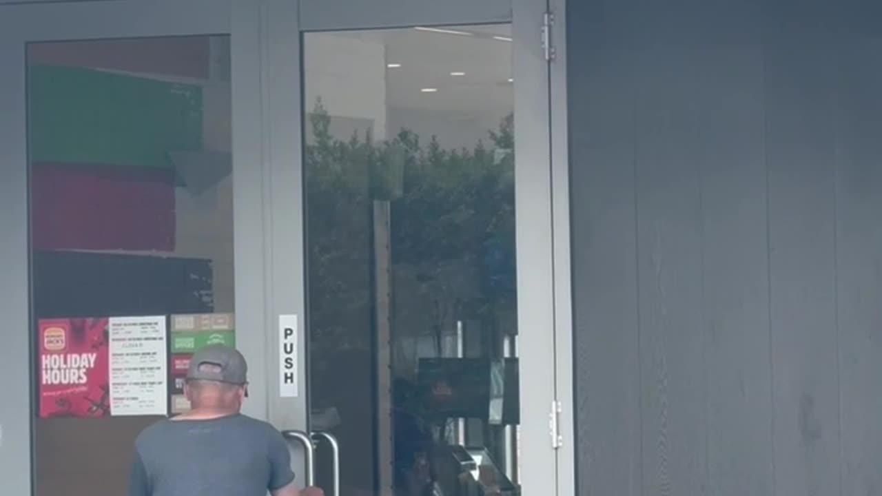 Push Sign on a Pull Door