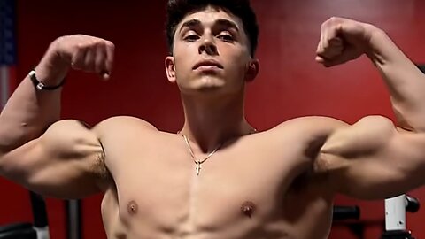 Handsome muscular man showing off his muscles