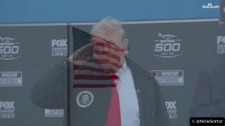 Massive cheers for President Donald J. Trump as he salutes the national anthem during the Daytona 500