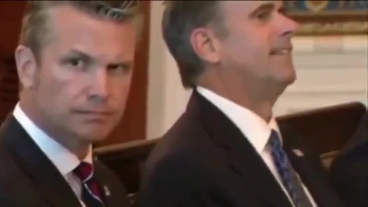 CIA Director John Ratcliffe grins, relaxes, and lets out a huge visible sigh of relief.