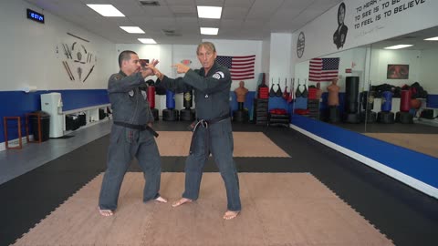 Correcting common errors executing the American Kenpo technique Obscure Sword