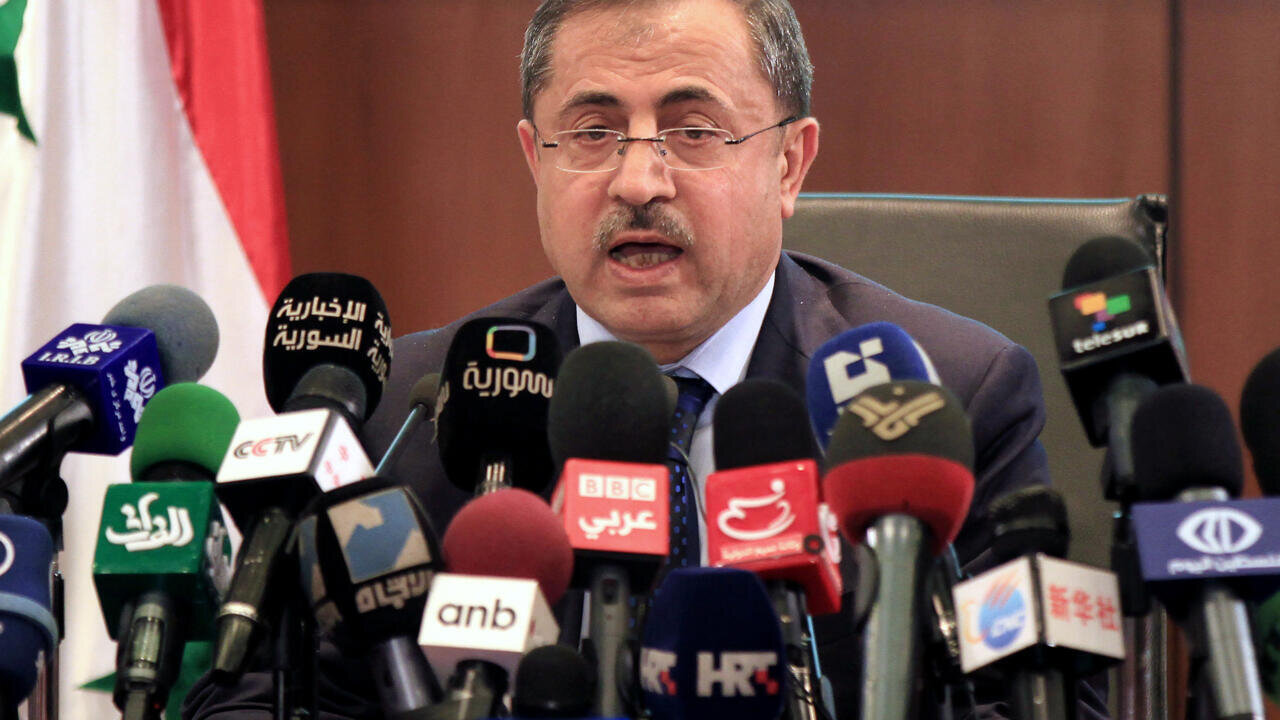 Assad's general interior minister surrenders to new government