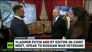 Vladimir Putin and RT editor-in-chief speak to Russian war veterans