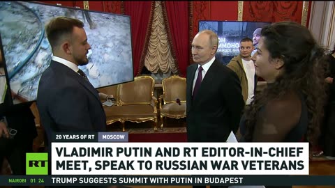 Vladimir Putin and RT editor-in-chief speak to Russian war veterans