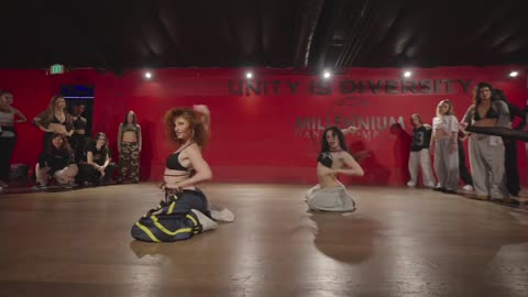 Freestyle ith their dance moves.