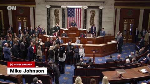 See moment Democrats sing and defy Johnson on House floor