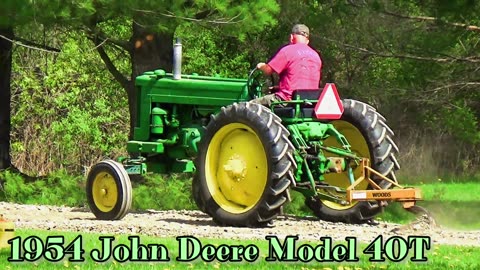 1954 John Deere Model 40T Raking With Woods Stone Rake