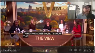 Whoopi is wearing what on her shirt