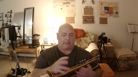 I PUT MY BASS GUITAR AWAY AND PICKED UP MY TRUMPET AGAIN.