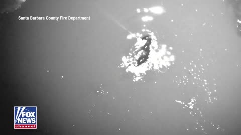 A surfer swept into deep water off the California coast was rescued after clinging to a lobster