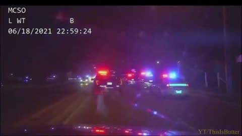 DASHCAM: Suspect Ambushes & Shoots At Officer Sitting In Squad Car, Pursuit Ensues