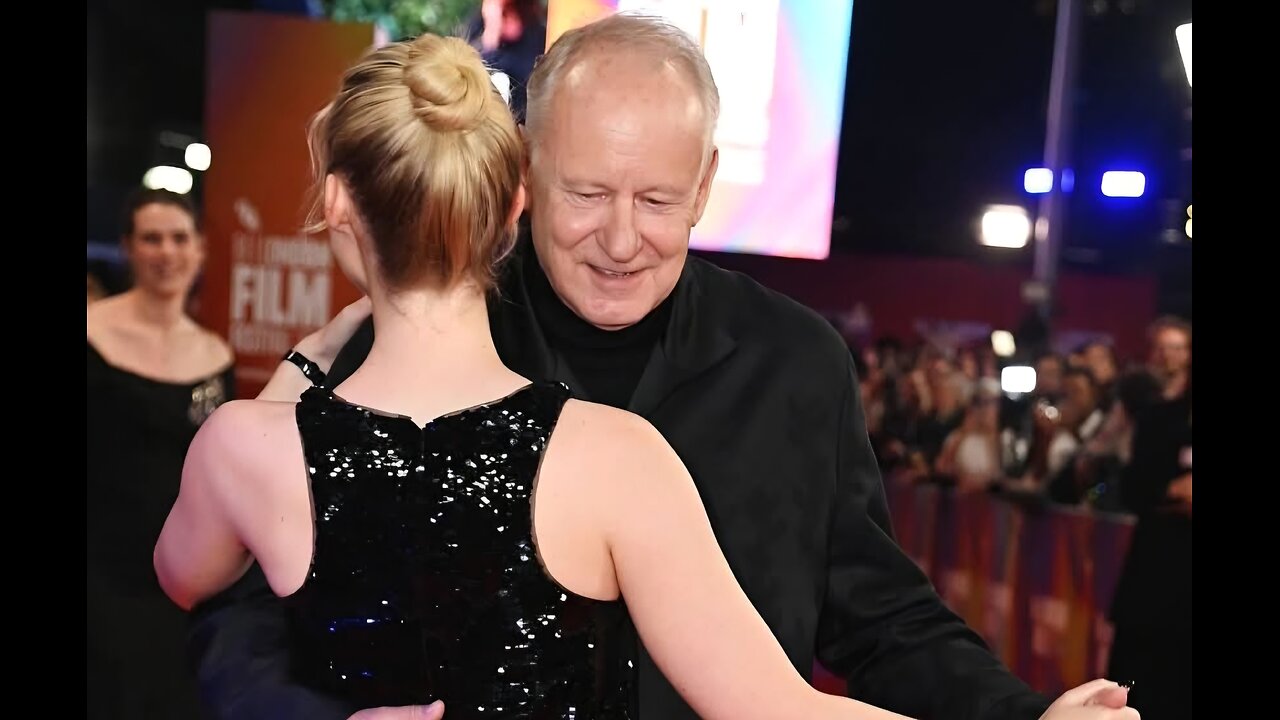 Stellan Skarsgård and Elle Fanning share a moment of dancing on the red carpet at the 69th BFI LFF.