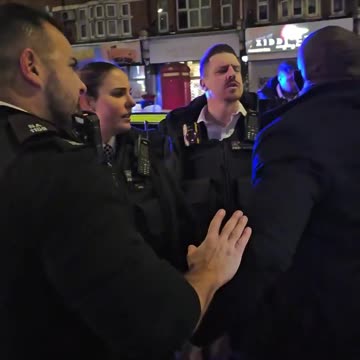 He spits at a British policewoman and shouts in her face but is not arrested.