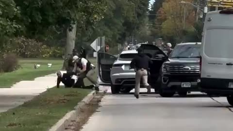 DHS agents have to forcibly detain a suspect from their vehicle in Beach Park, Illinois.