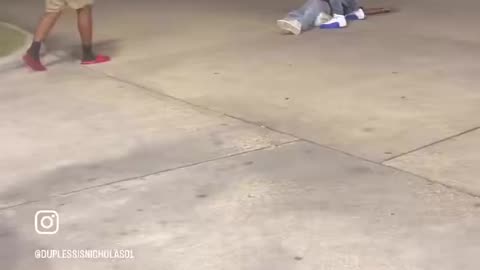 A black man is unconscious in a parking lot and black good samaritans come to his rescue.