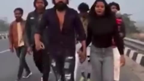 In India a group of influencers filming a video for TikTok while crossing a highway got hit (1).mp4