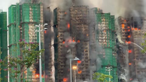 Massive fire engulfed several high-rise buildings in a Hong Kong residential estate, at least 4 dead