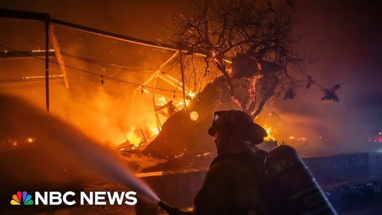 California wildfire scorches abandoned cars left behind by evacuees