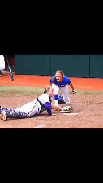 Softball player shows complete poor sportsmanship towards catcher after scoring
