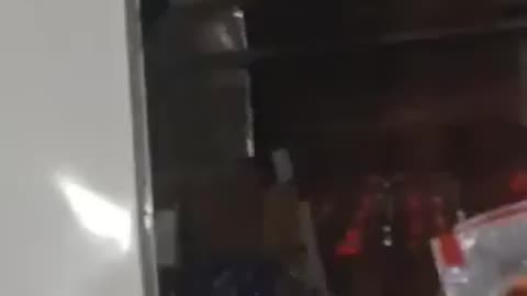 Rosslare Illegal migrants being caught in camera being smuggled into Ireland.