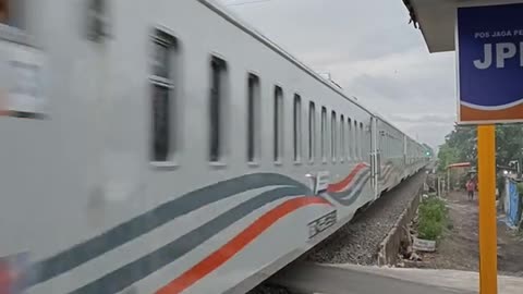 High-Speed Train Blazing Through the Countryside"