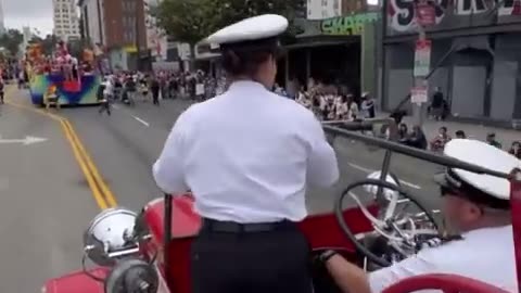 Los Angeles Fire Department celebrated in a pride parade. The Police Chief handed out...