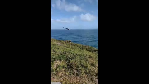 Police Helicopter Cooperates With Posing Tourists