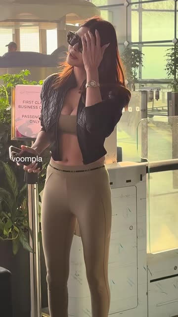 oops! sherlyn chopra’s bags tumble at the airport.