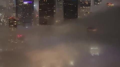 An aerial view shows thick fog covering parts of Los Angeles, California ! Watch my comment!