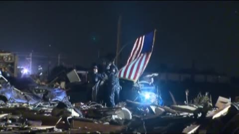 First responders raise American flag over tornado's destruction Oklahoma