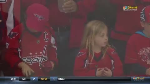 She wanted a puck so badly and this hockey player made it happen