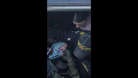 Even the Hamasonazi Terrorists have to protect the Hostages from "Innocent Civilians" on transfer