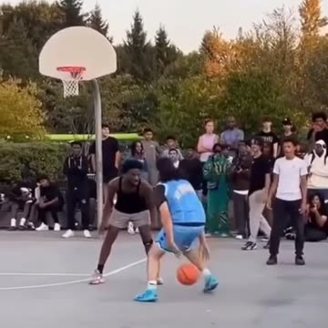Basketball wizard messes with a defender's mind.