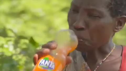 Hadzabe tribe from Tanzania try Fanta soda for the first time.