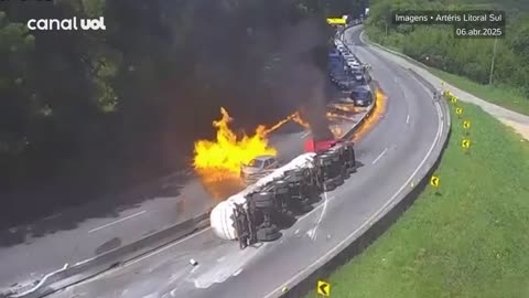 Tank truck crashes and explodes, destroying 27 cars.