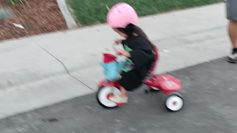 August 7, 2022 - Madi bicycling in neighborhood - Roseville, CA