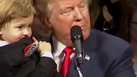 Trump shares a moment with a Child in whats your name