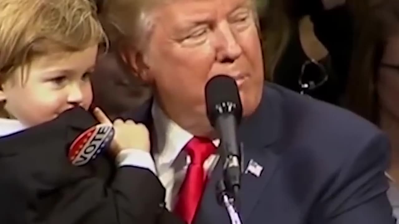 Trump shares a moment with a Child in whats your name