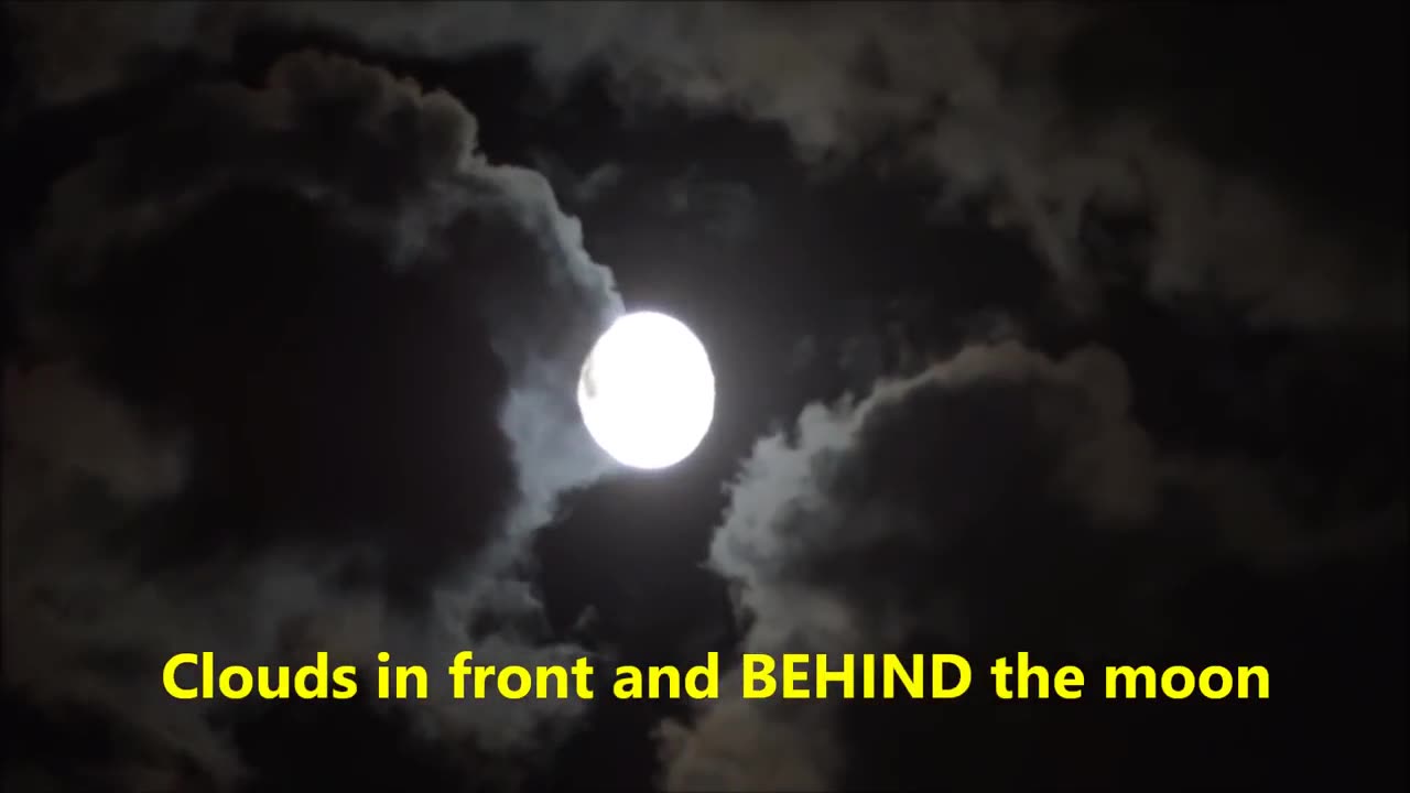 Clouds behind the moon