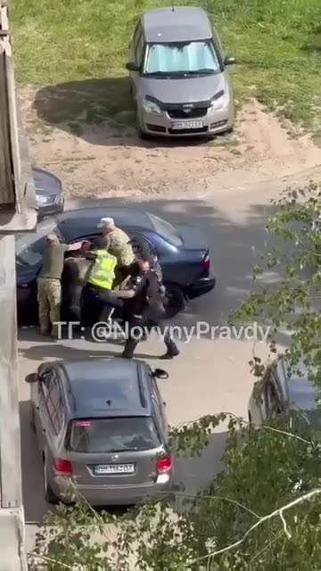 Men in Ukraine being grabbed off the street and forced into war