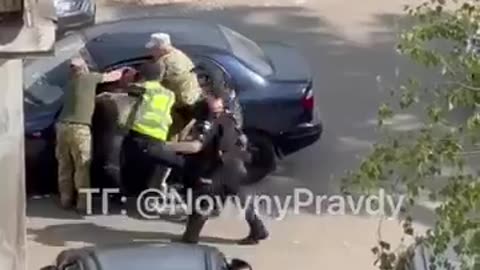 Men in Ukraine being grabbed off the street and forced into war