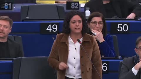 EU Parliament members get heated over a banner displayed by the ECR group