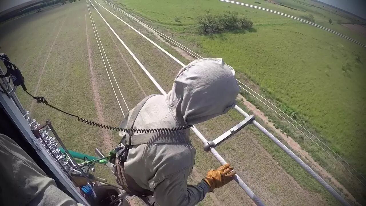 Daring Heights: The Art of Barehanding 345,000 Volts as a Helicopter Lineman"