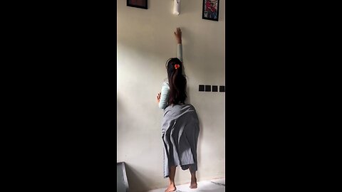 A cute girls dancing and showing his dancing moves