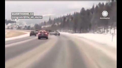 Subaru loses control on snowy highway on Interstate 70 in Colorado