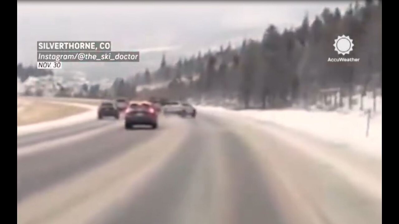 Subaru loses control on snowy highway on Interstate 70 in Colorado