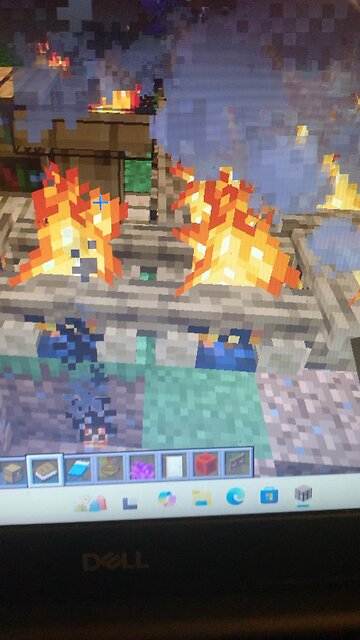 I built a campfire and a bed to sleep next to the campfire in Minecraft