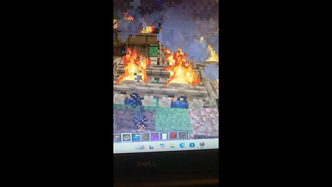 I built a campfire and a bed to sleep next to the campfire in Minecraft