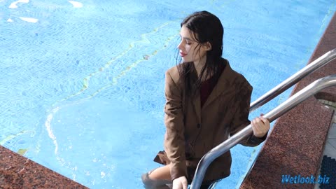 Wetlook girl in leather Boots